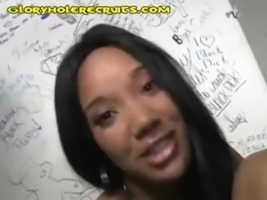 Black chick with a nice set of knockers gives a white dick in a glory hole a...