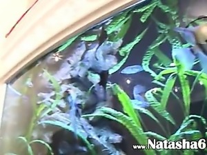 Natashas hole rubbing on big aquarium
