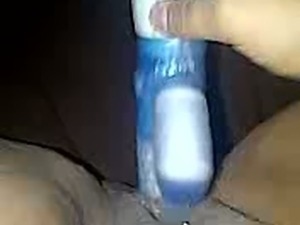 Playing with her sex toy