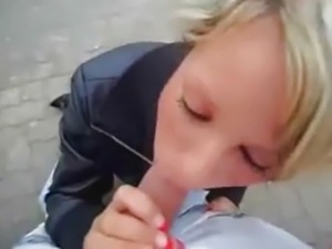German babe gives public blowjob 