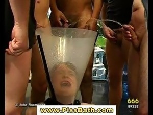 Babe drinks piss and gets anal in watersports gangbang