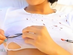 Busty model torturing her nipples