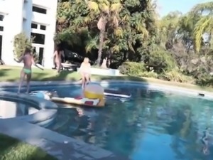 Babes sharing one huge cock by the pool