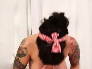 Tattooed babe Dollie Darko loves rough anal sex on a sofa