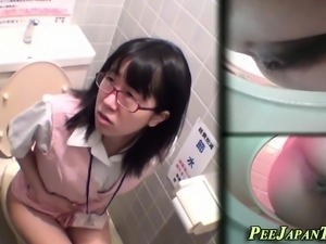 Asian pees in public wc