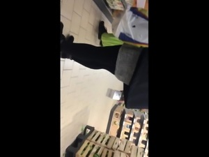 Milf in black pantyhose in supermarket