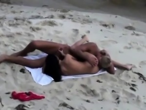 Wild brunette teen has sex with her boyfriend on the beach