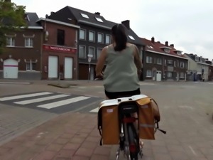 girl with tattoo&#039;s on a bike