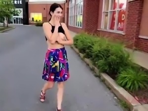 Naked brunette teen fucks herself with a dildo in public
